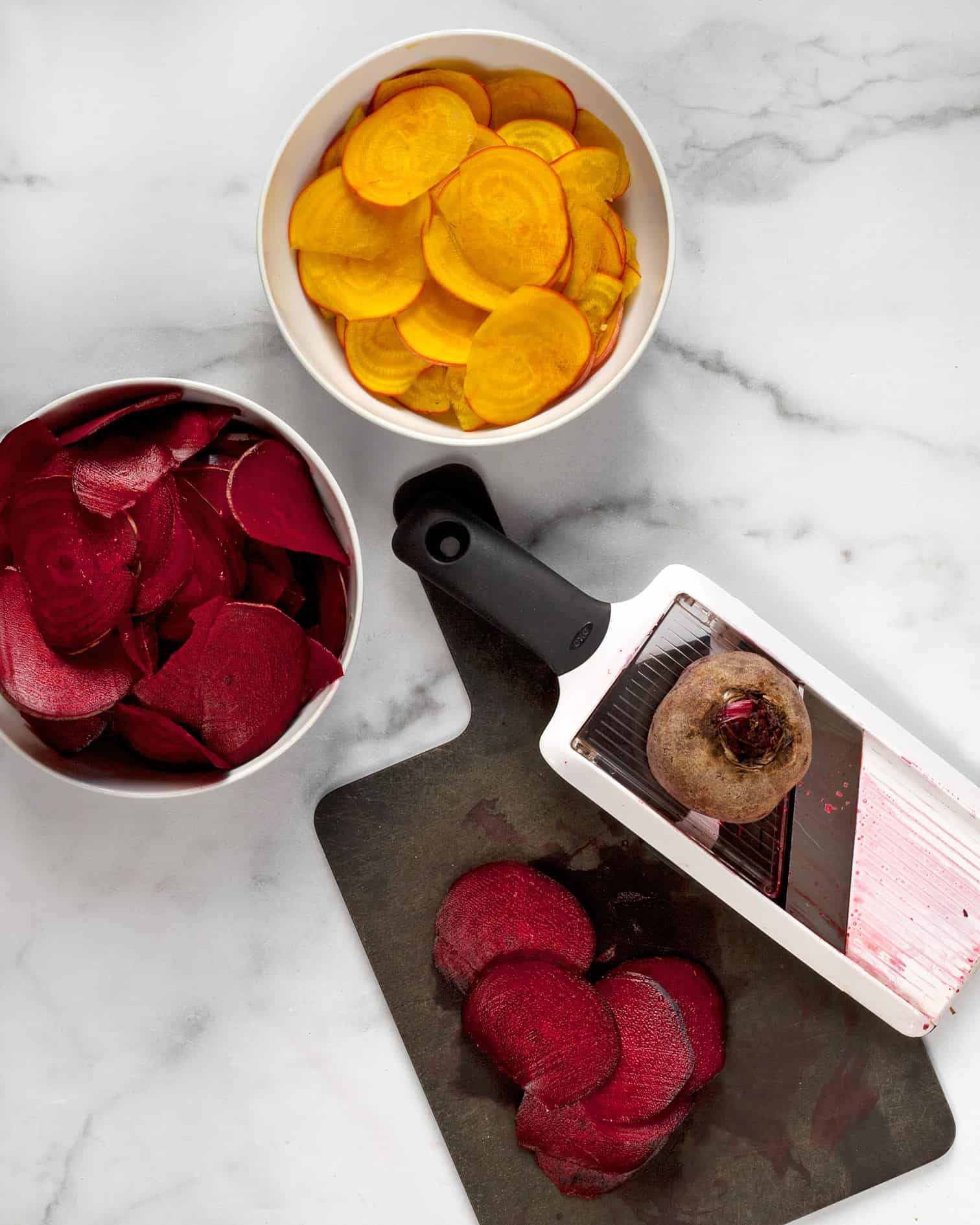 Slicing beets with a mandolin