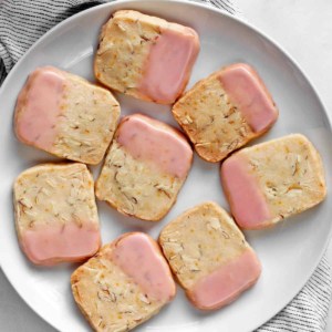 Eight icebox cookies on a plate.