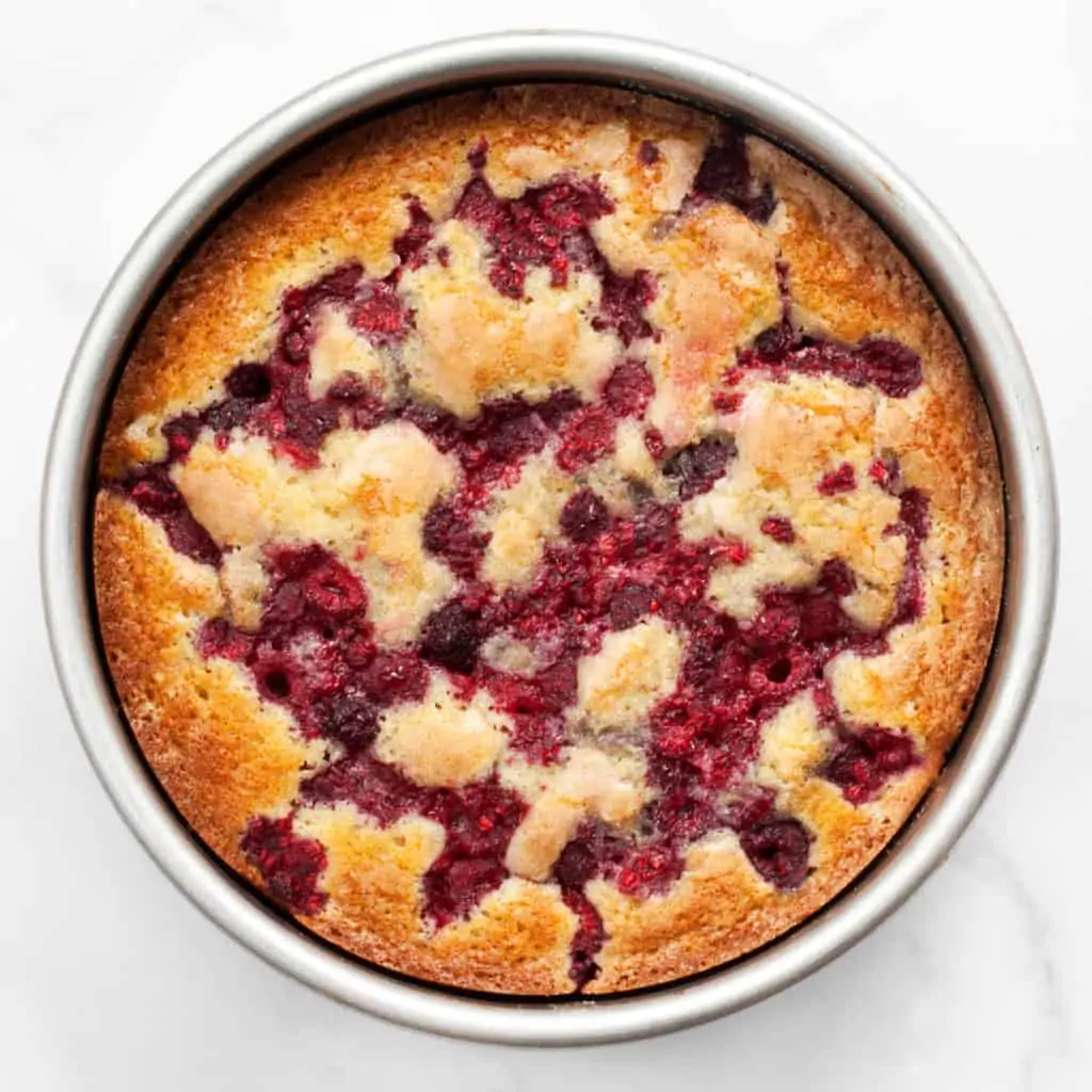 Raspberry buttermilk cake in a pan