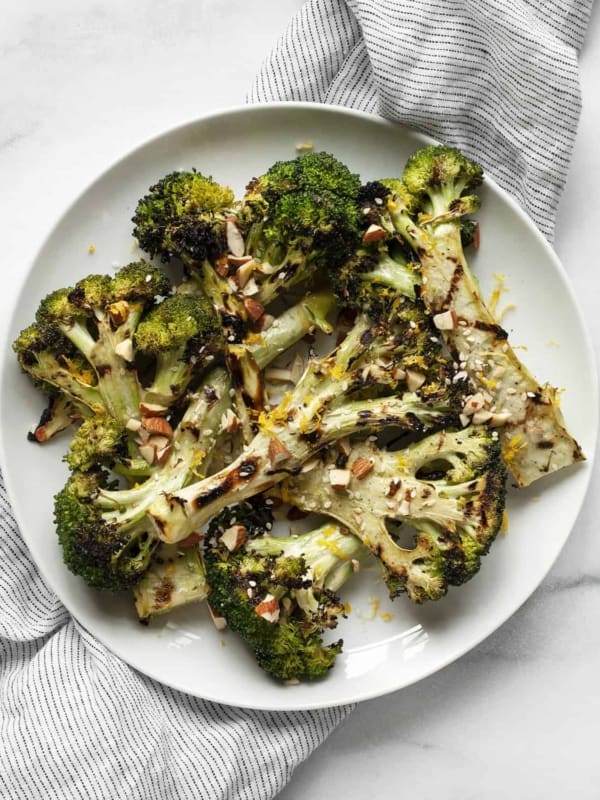 Lemon grilled broccoli on a plate.