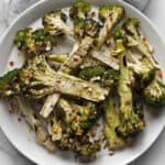 Lemon grilled broccoli on a plate.