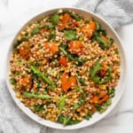 Grilled apricot corn couscous in a bowl.