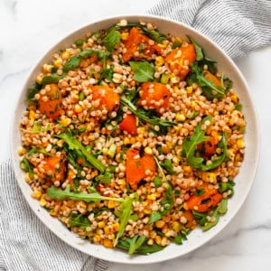 Grilled apricot corn couscous in a bowl.