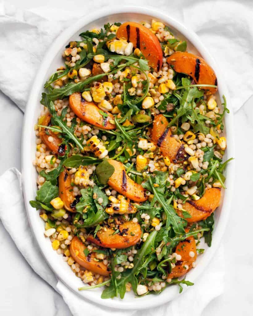 Grilled Apricot and Corn Harissa Couscous