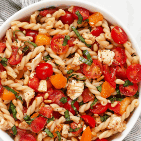 Bruschetta pasta salad in a bowl.