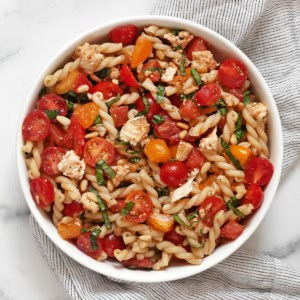 Bruschetta pasta salad in a bowl.