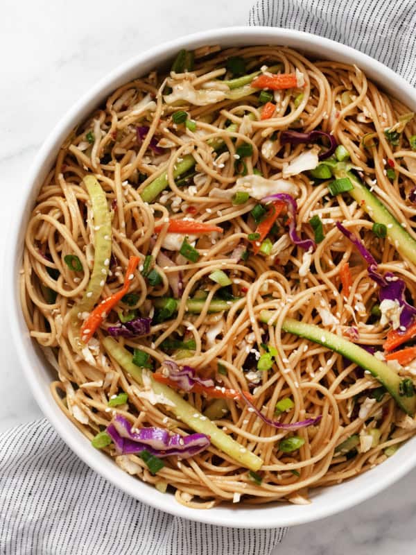 Cold sesame noodles in a serving bowl.