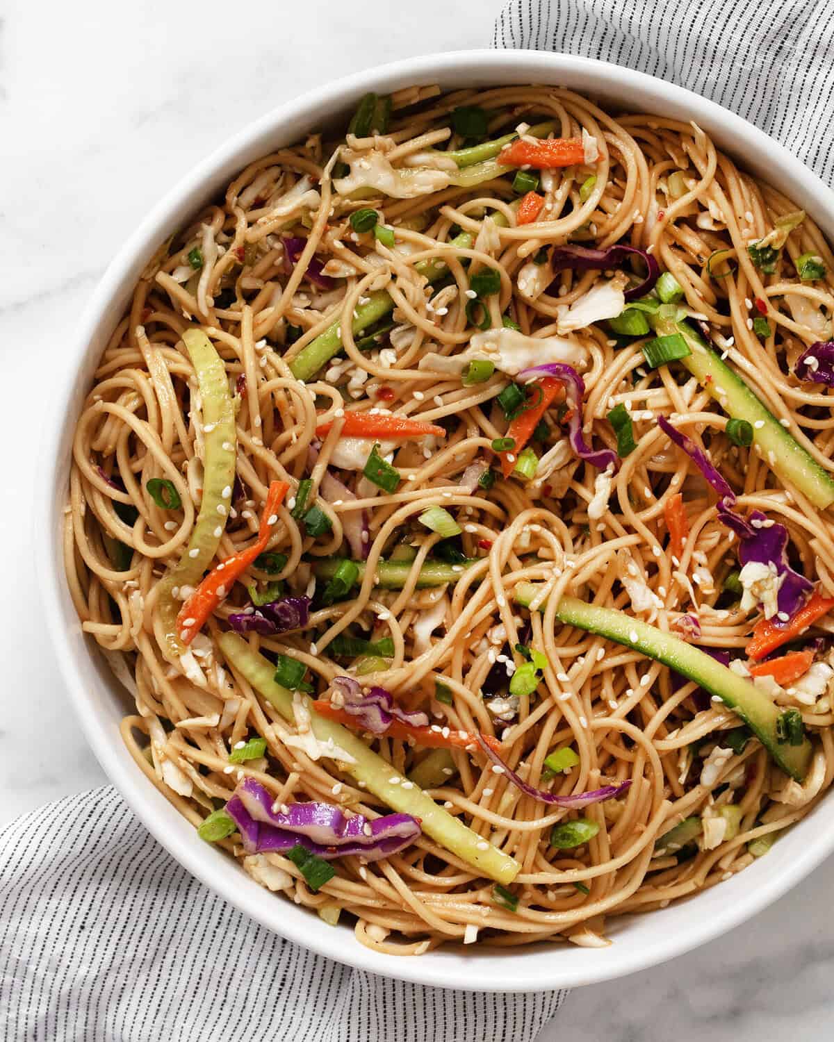 Cold sesame noodles in a serving bowl.