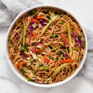Cold sesame noodles in a serving bowl.