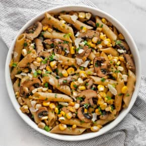 Mushroom corn penne in a bowl.