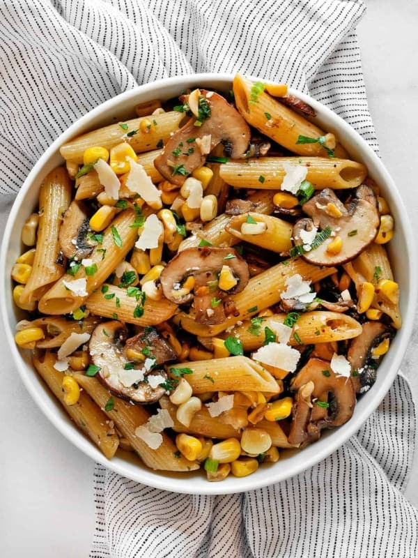 Mushroom corn pasta in a bowl.