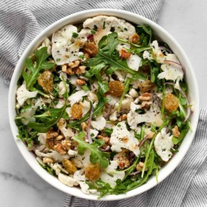 Shaved cauliflower salad in a bowl.