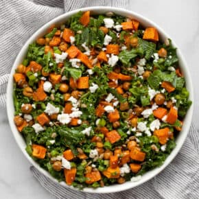 Sweet potato and chickpea kale salad in a bowl.