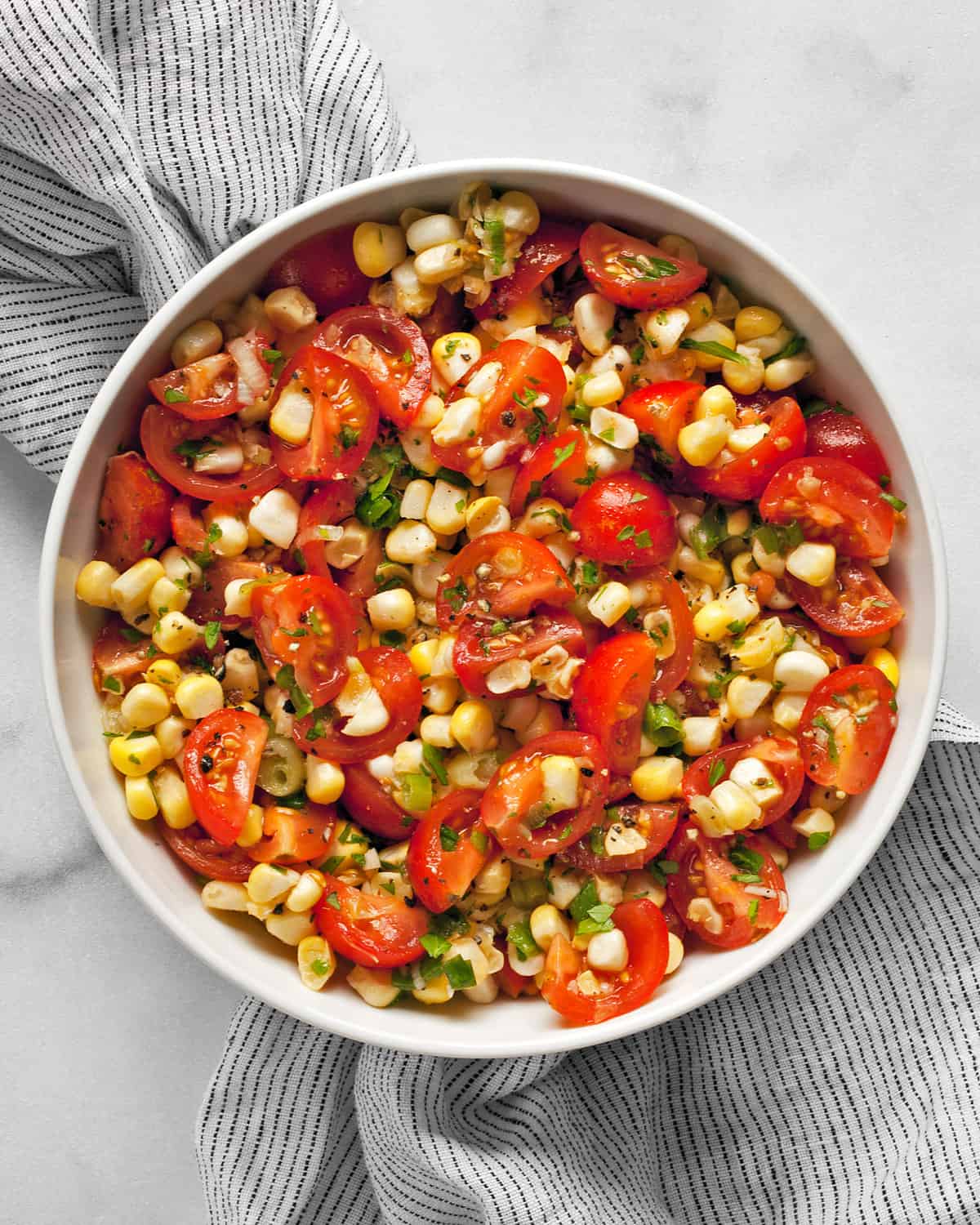 Corn tomato salad in a bowl.