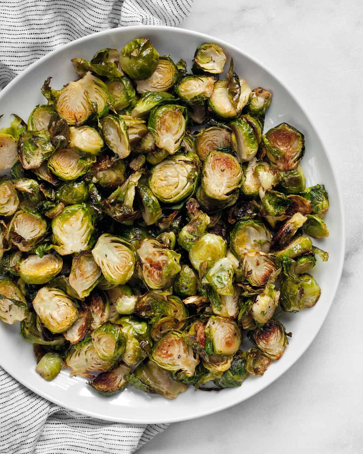 Roasted brussels sprouts on a plate.