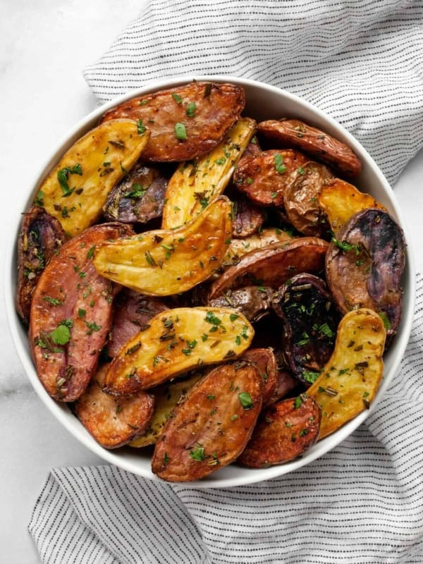 Roasted potatoes in a bowl.