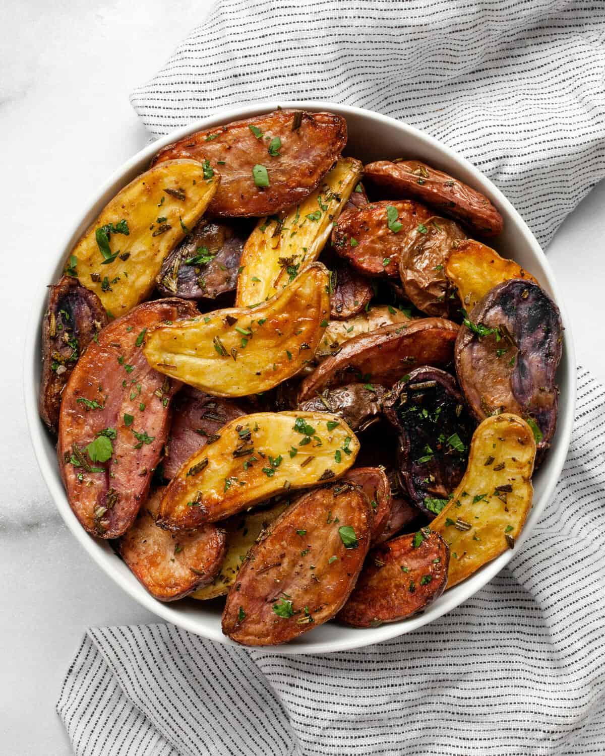 Roasted potatoes in a bowl.