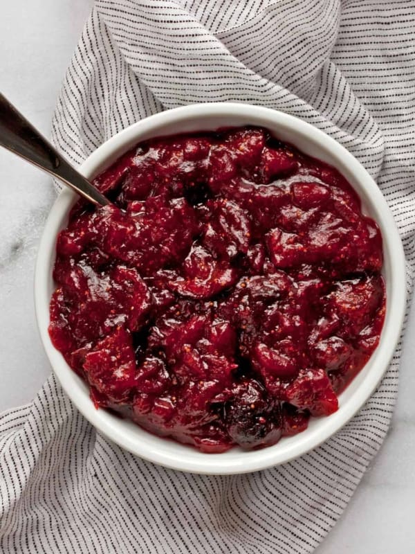 Small bowl with cranberry sauce.