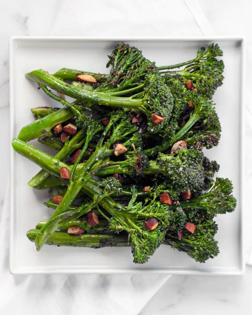 Sauteed broccolini topped with almonds