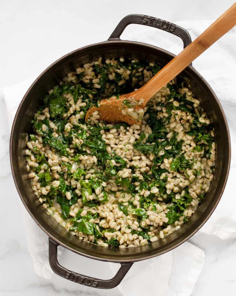 Stir the remaining kale leaves and pesto into the risotto