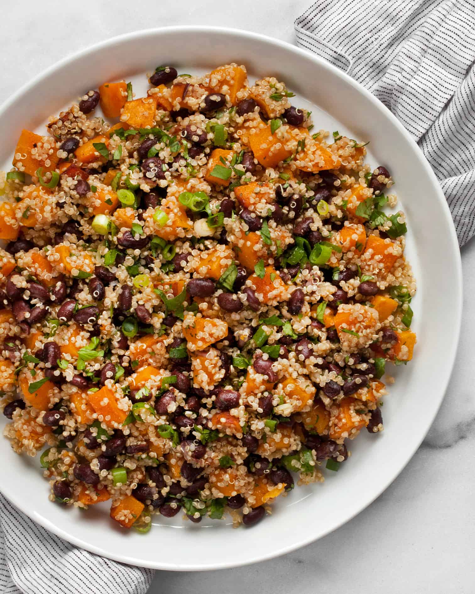 Butternut squash quinoa with black beans on a plate