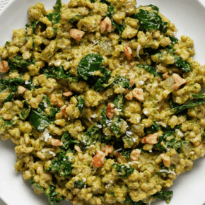 Baked kale barley risotto on a plate.