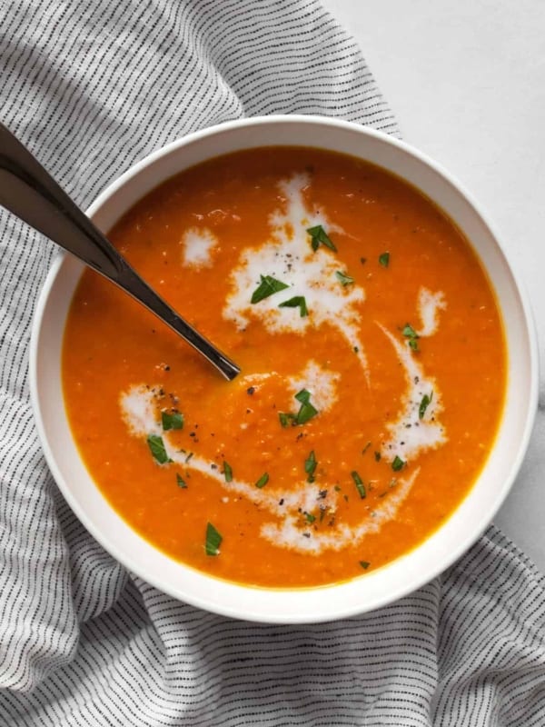 Vegan carrot ginger soup in a bowl.