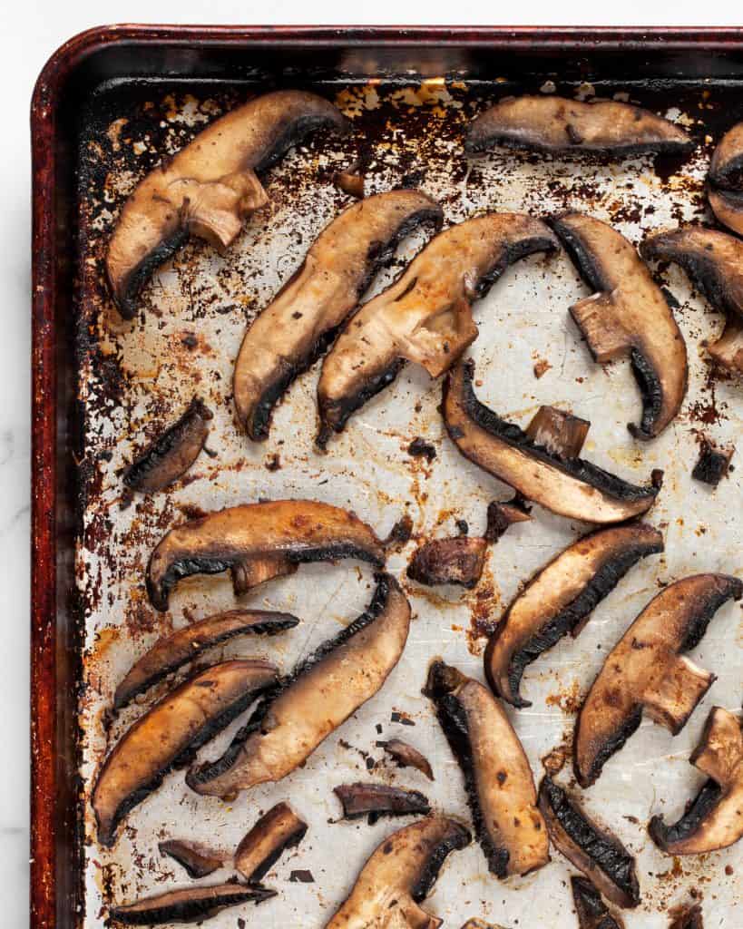 Roasted portobello mushrooms on a sheet pan