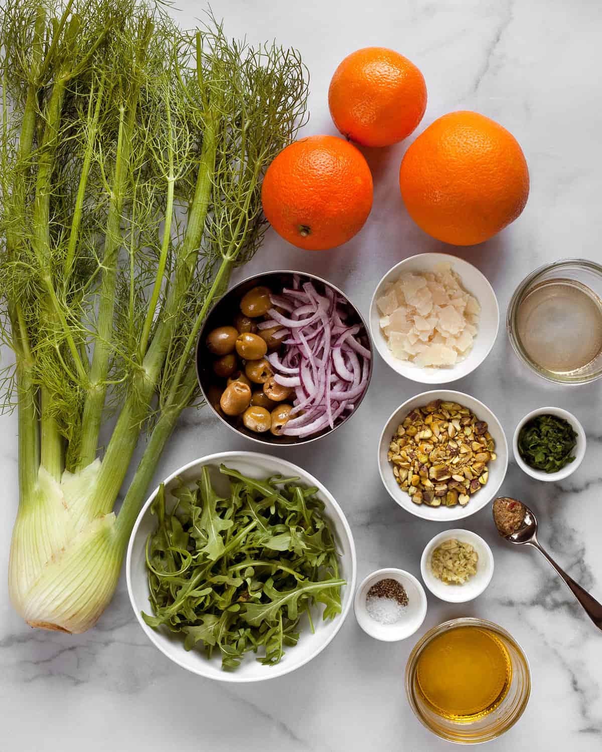 Ingredients including, fennel, oranges, onions, pistachios, garlic, mustard, vinegar and olive oil.