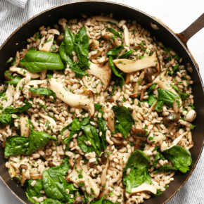 Wild mushroom barley in a skillet.