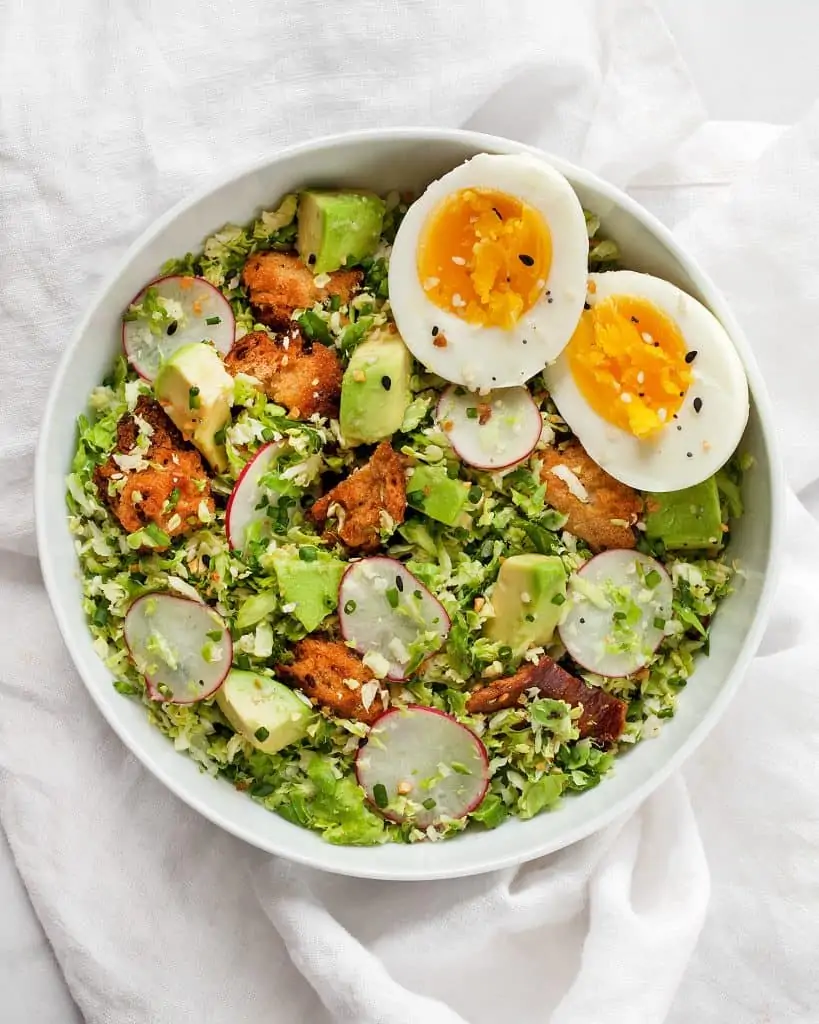 Brussels salad with eggs and avocado