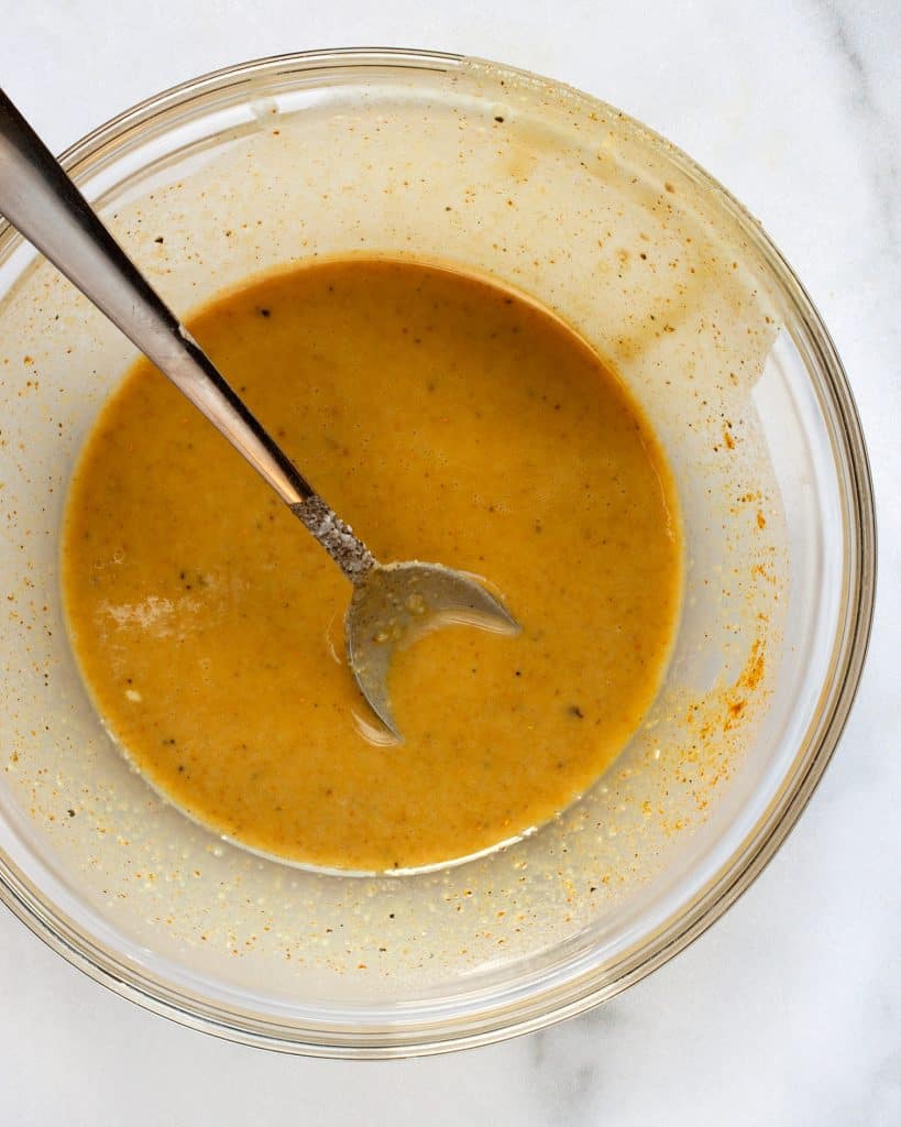 Curry tahini marinade in a bowl