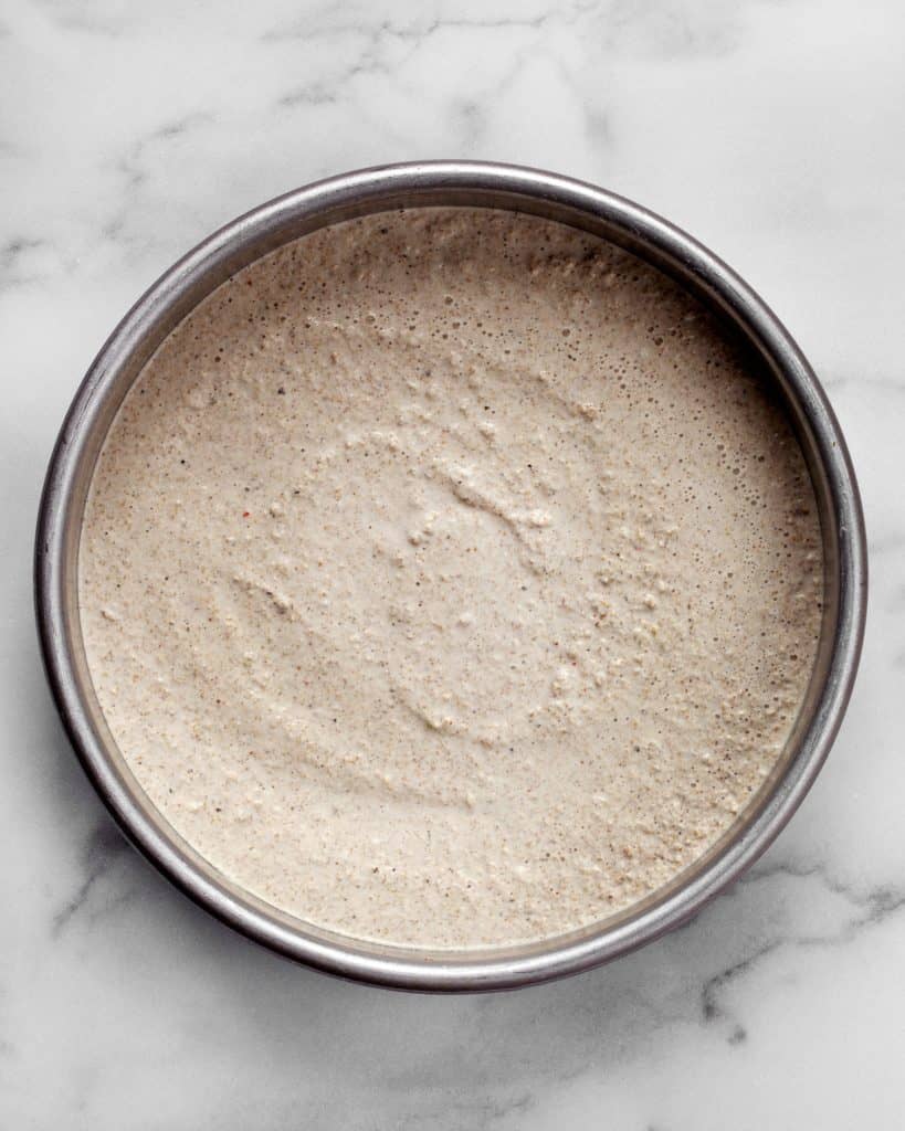 Quinoa dough in a pan before it is baked