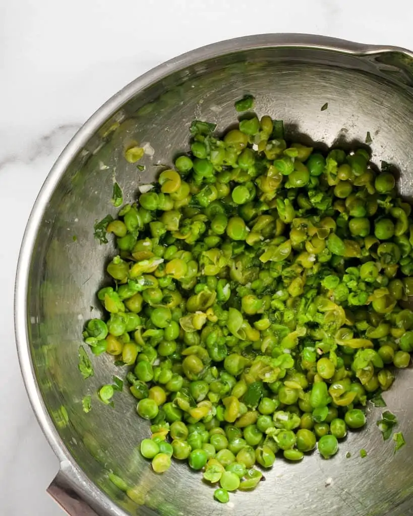 Smashed peas in a bowl