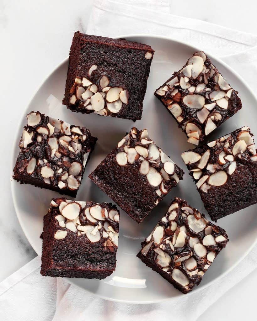 Slices of coffee almond cake on a plate