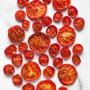 Small, medium and large roasted tomatoes.