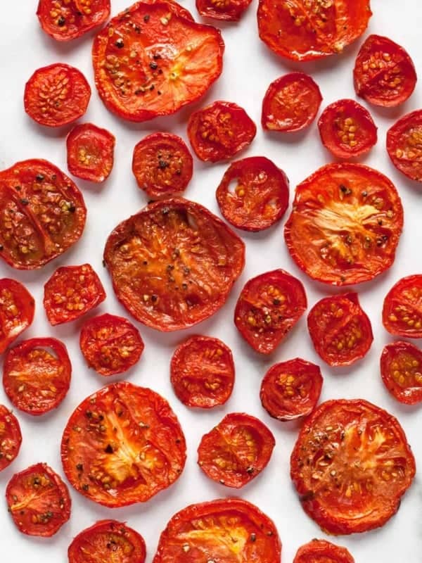 Small, medium and large roasted tomatoes.