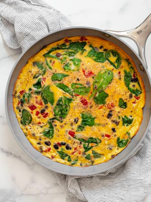Black bean red pepper frittata in a skillet.