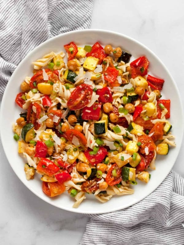 Roasted vegetable chickpea pasta salad on a plate.