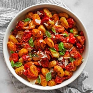 Cherry tomato sheet pan gnocchi in a bowl.