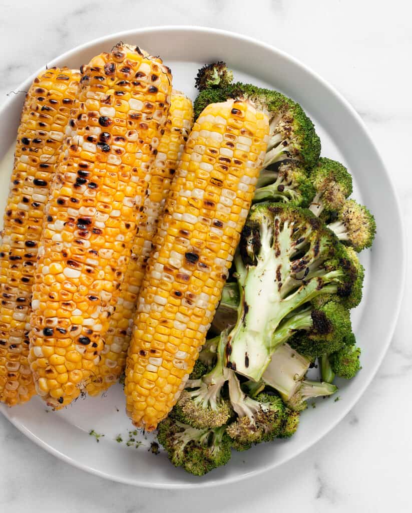 Grilled corn and broccoli on a plate
