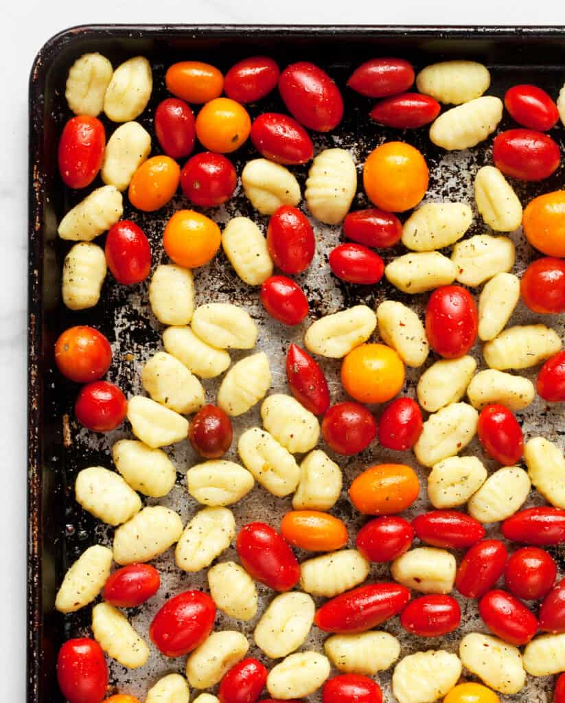 Gnocchi and tomatoes on a sheet pan
