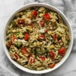 Roasted zucchini tomato orzo in a bowl