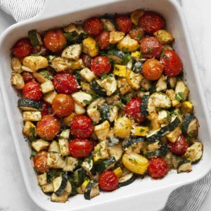 Balsamic zucchini tomato bake in a casserole dish.