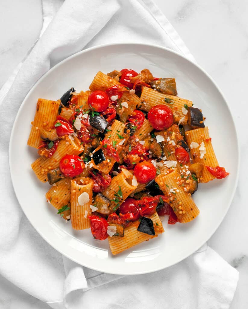 Pasta with sauteed cherry tomatoes and eggplant