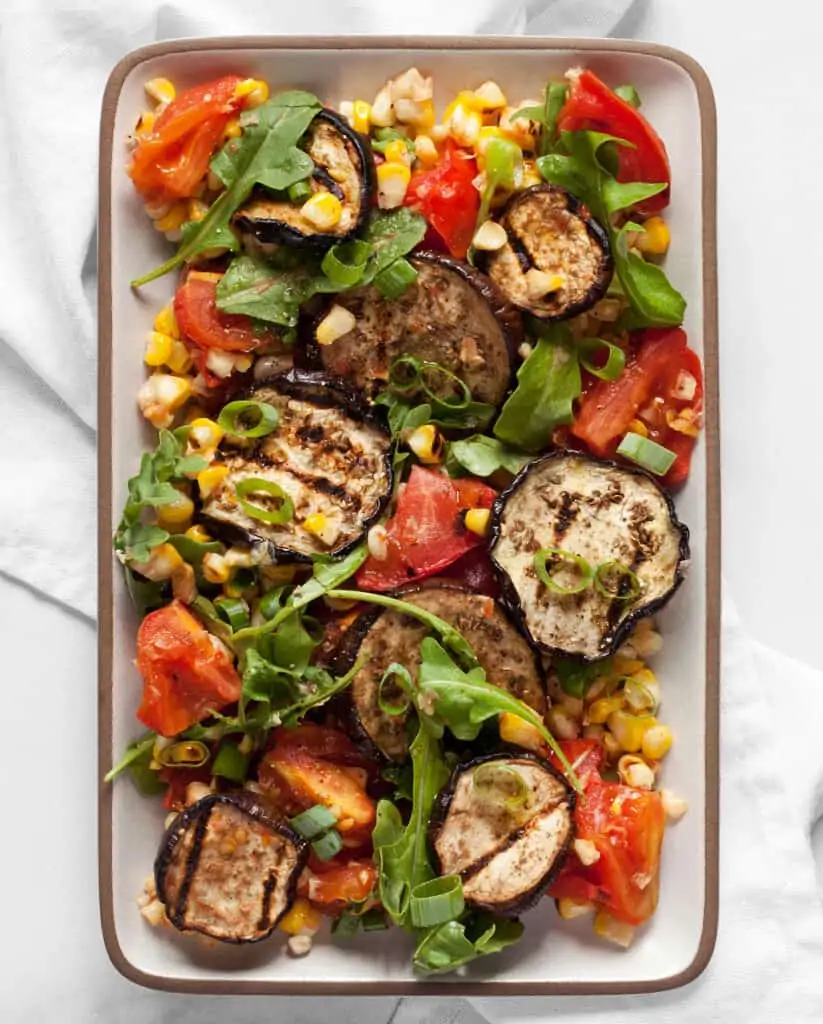 Grilled eggplant, tomatoes and corn