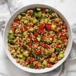 Harissa roasted tomato couscous in a bowl.