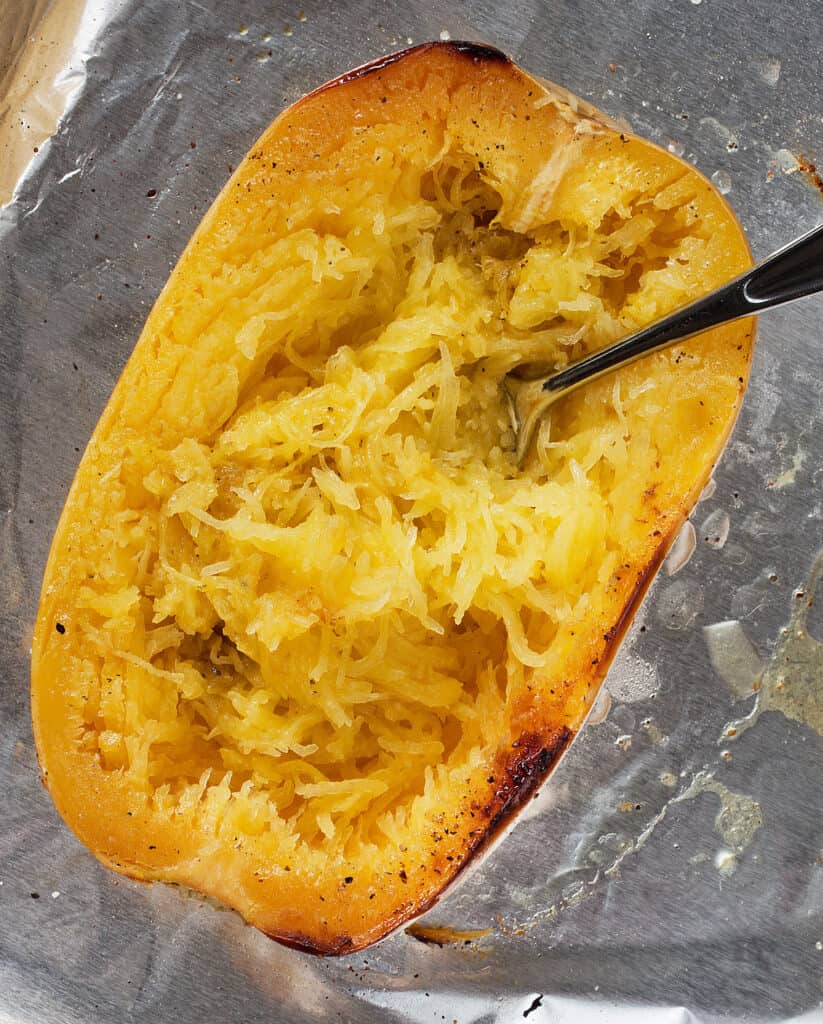 Comb out the roasted spaghetti squash flesh with a fork