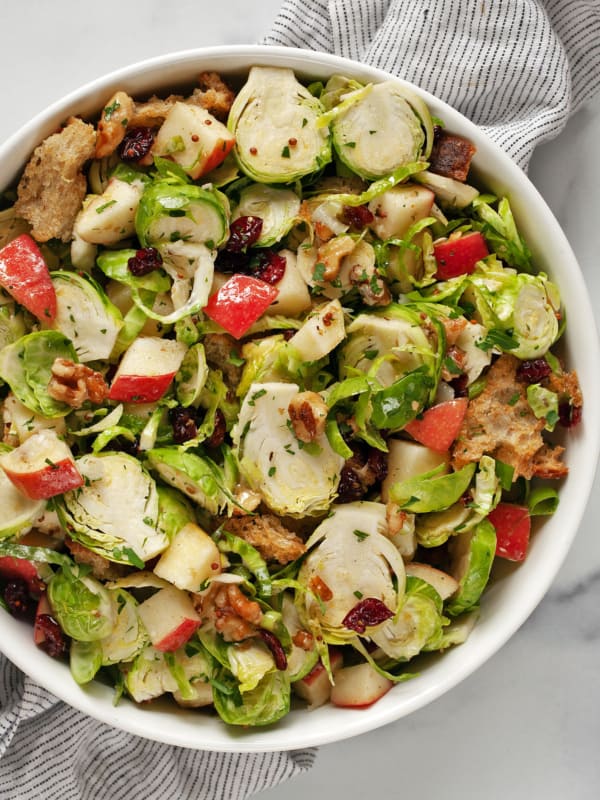 Brussels sprout apple salad in a bowl.