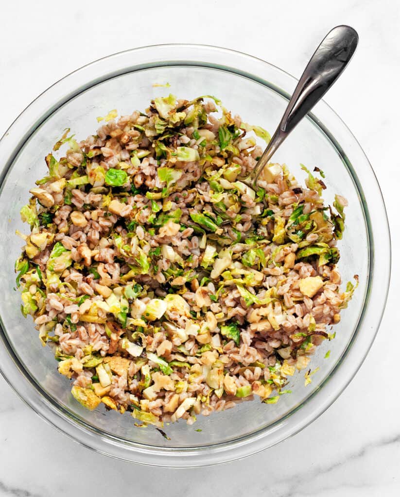 Stir the brussels sprouts and walnuts into the farro